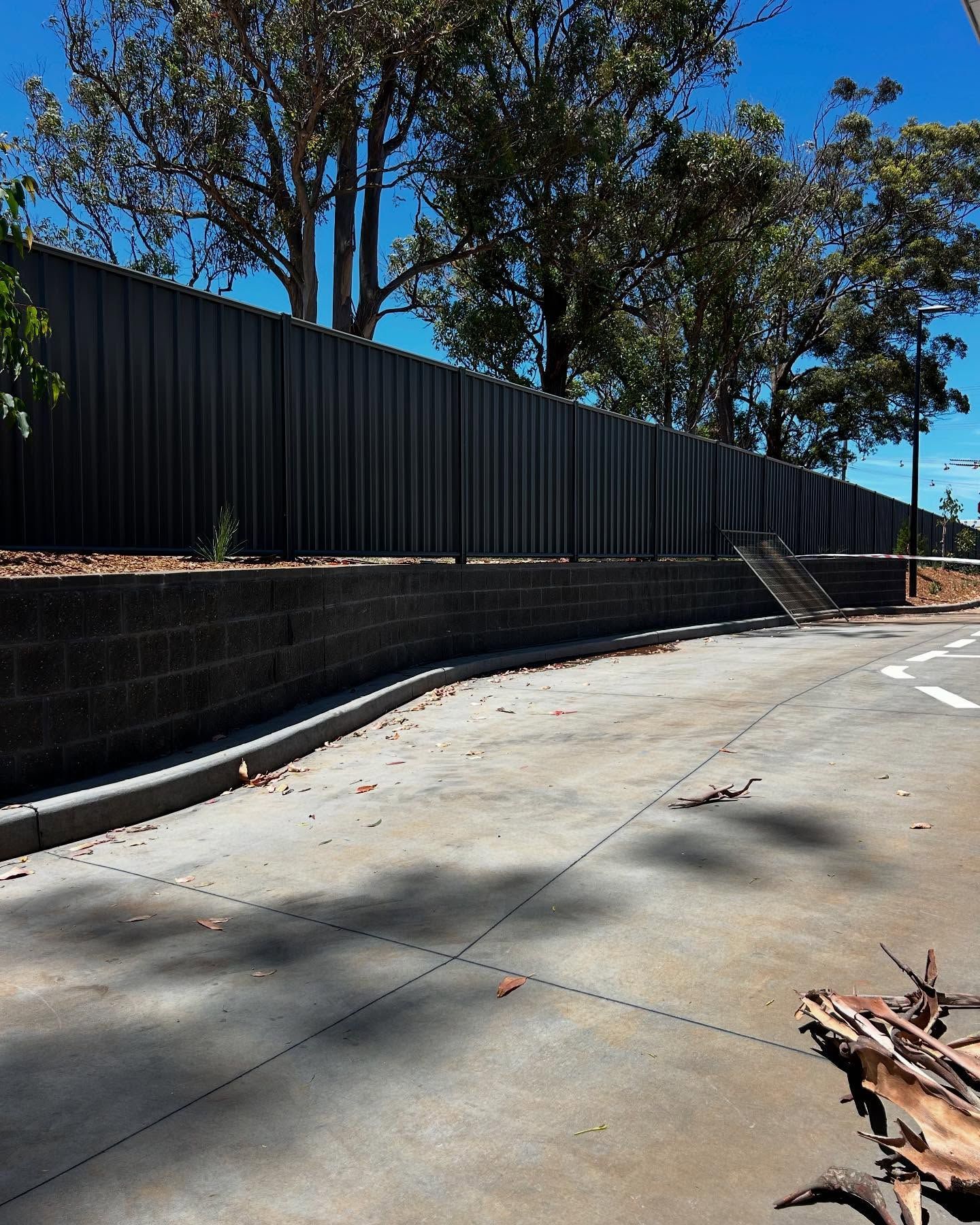 Commercial Brick Wall with Fenceβ Millers Masonry In Port Macquarie, NSW