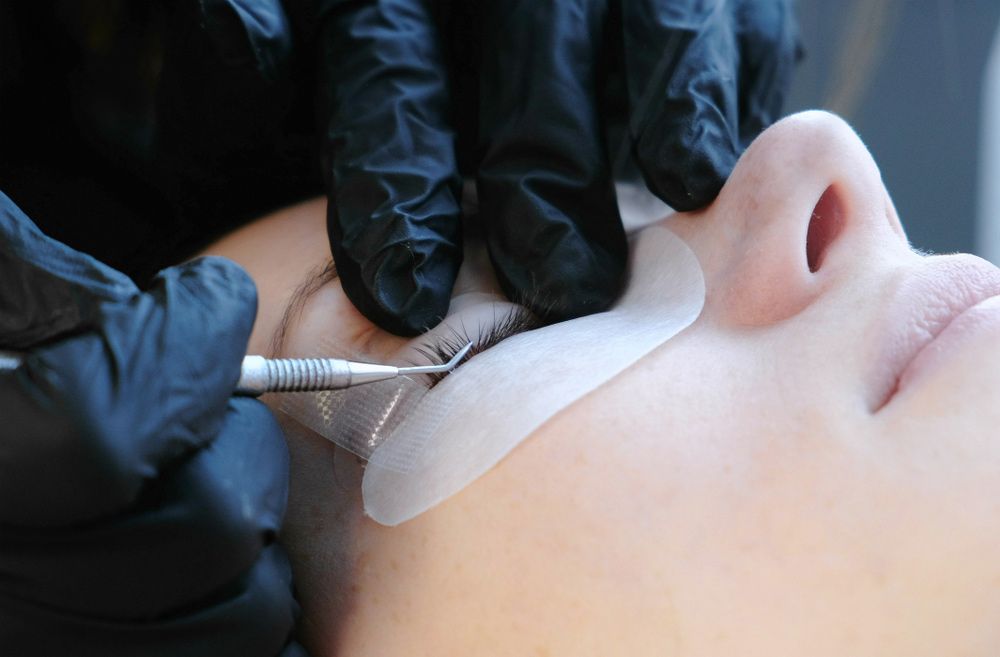 Curling Eyelashes by Using a Curler — Bersantai Medispa in Toukley, NSW