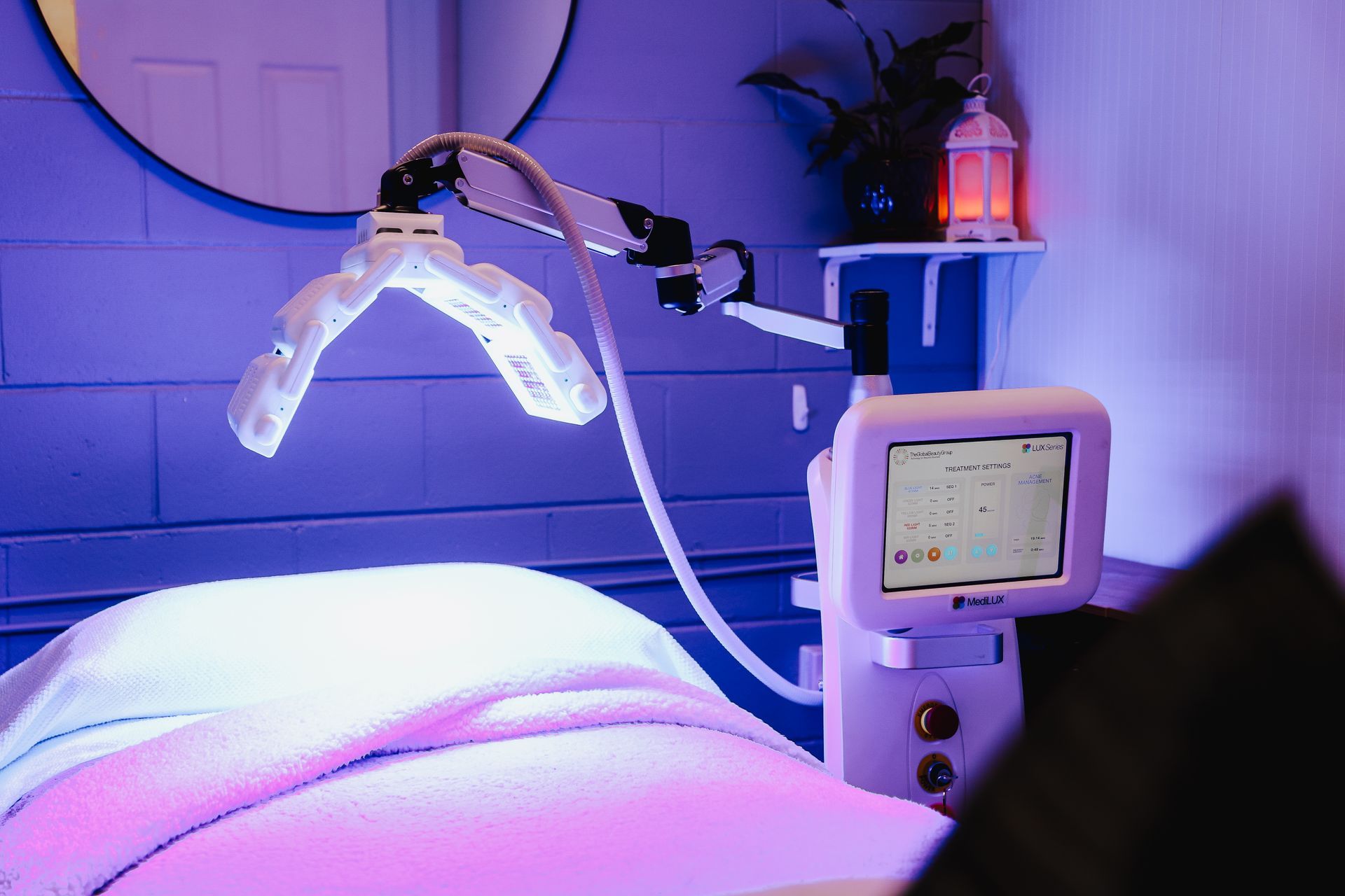 Young Woman Applying Body Lotion on Legs — Bersantai Medispa in Toukley, NSW