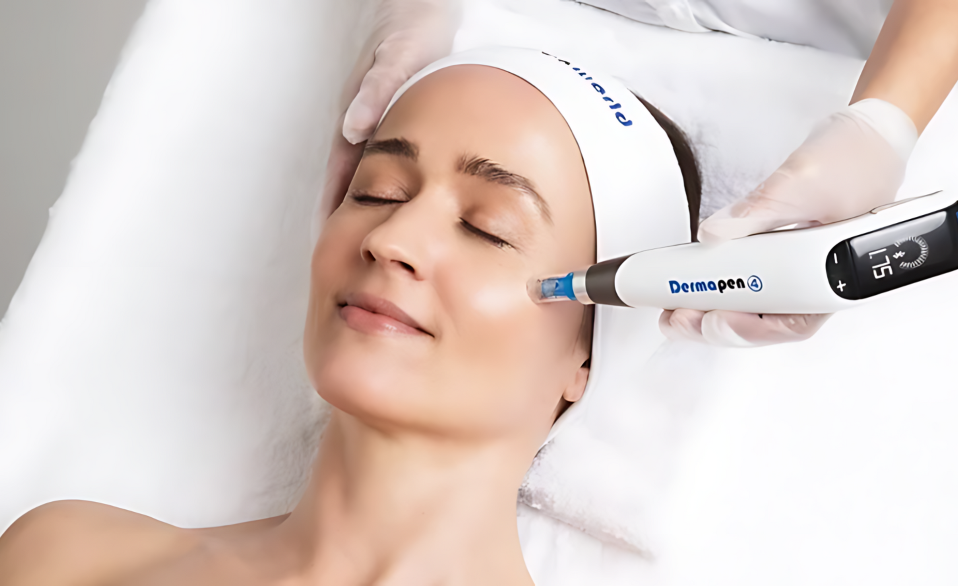 A Woman is Getting a facial Treatment at a Beauty salon — Bersantai Medispa in Toukley, NSW