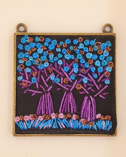 A painting of three trees with blue and purple flowers on a black background