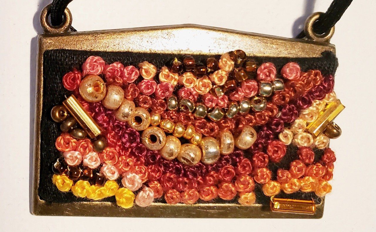 A necklace with a lot of beads on it