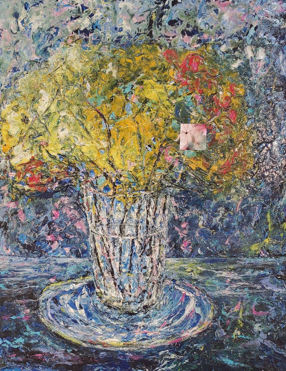 A painting of flowers in a vase on a plate on a table.