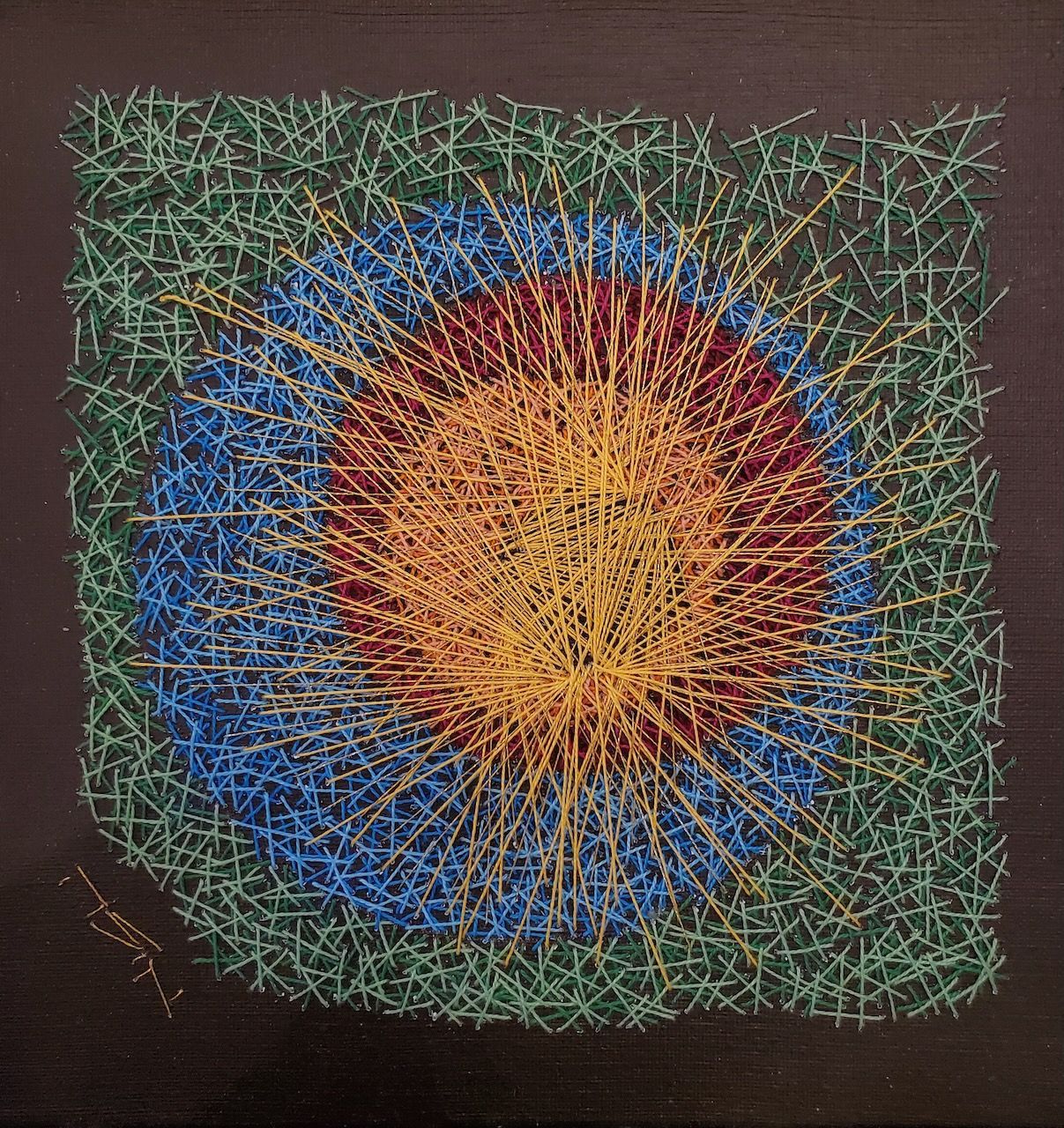 A painting of a flower with a circle in the middle