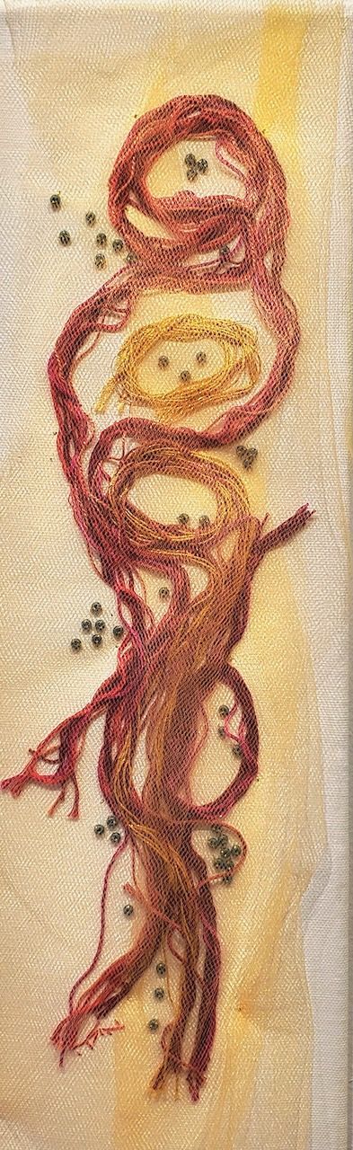 A close up of a painting of a snake on a piece of paper.