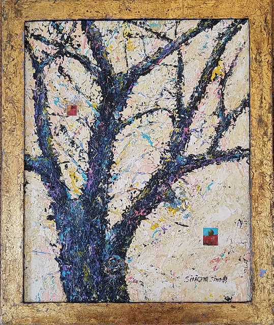 A painting of a tree in a gold frame