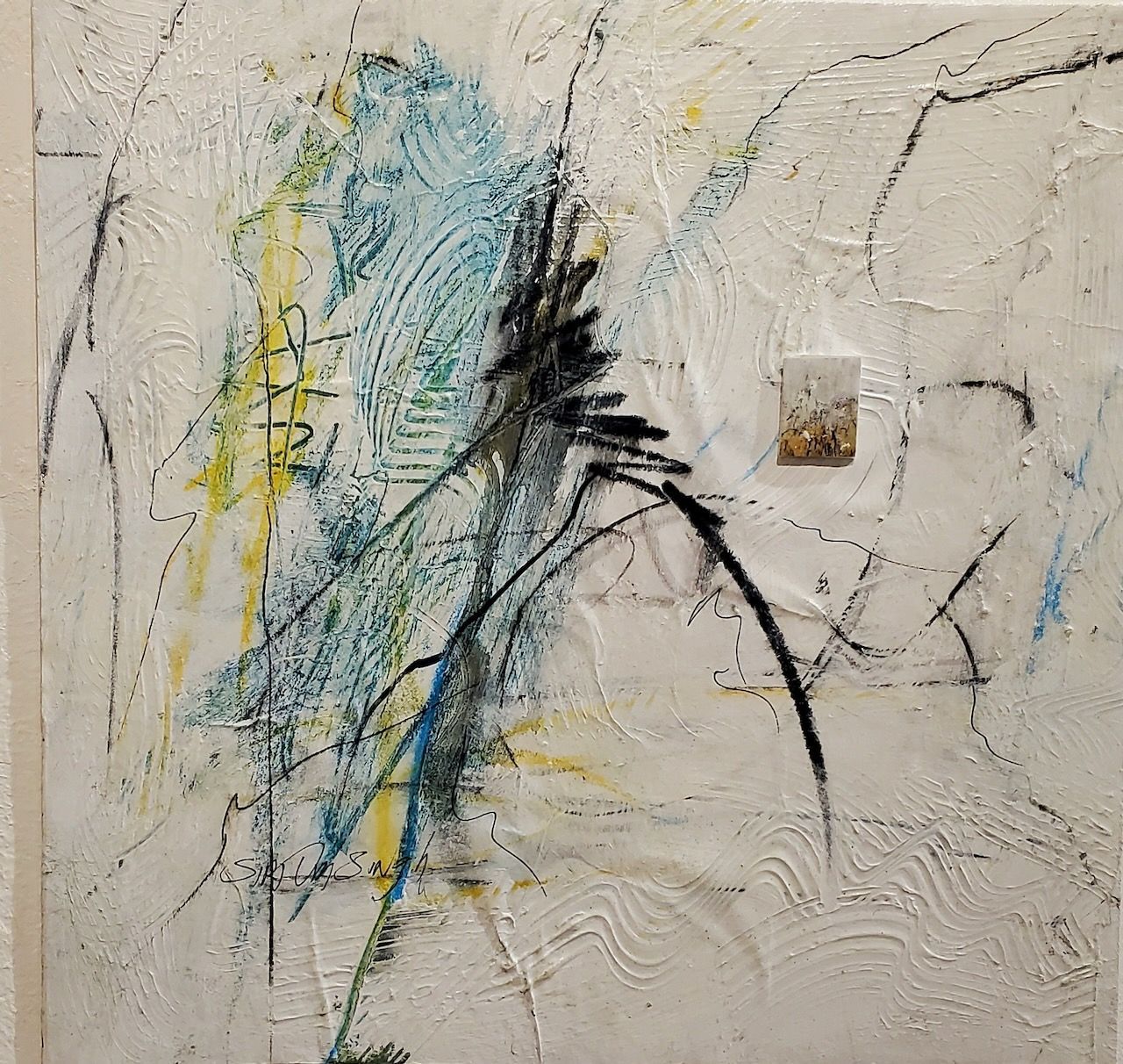 A close up of a painting on a wall