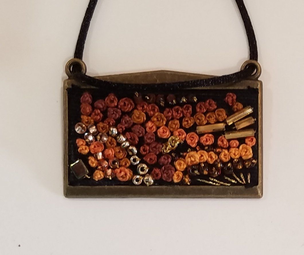 A necklace with a lot of beads on it