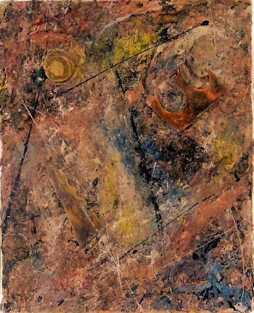 A close up of a painting with a lot of colors on it