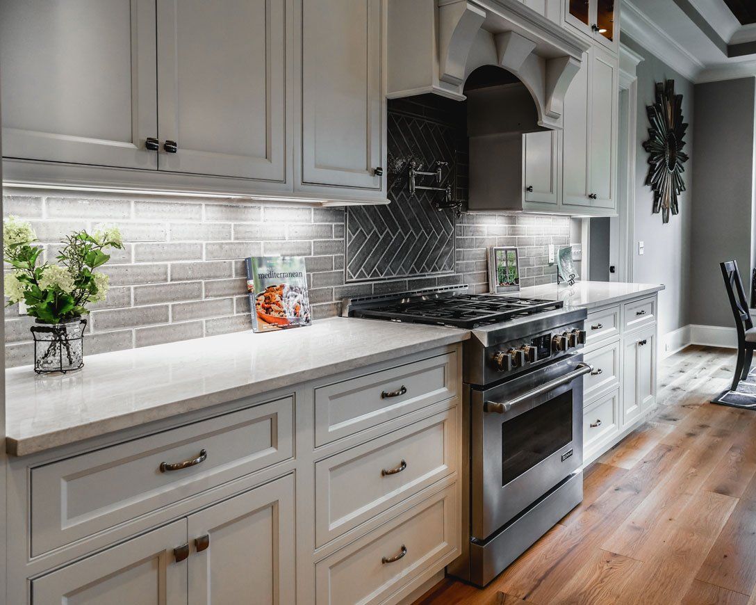 Elegant Kitchen — Modern Stove and Cabinets in Savannah, GA