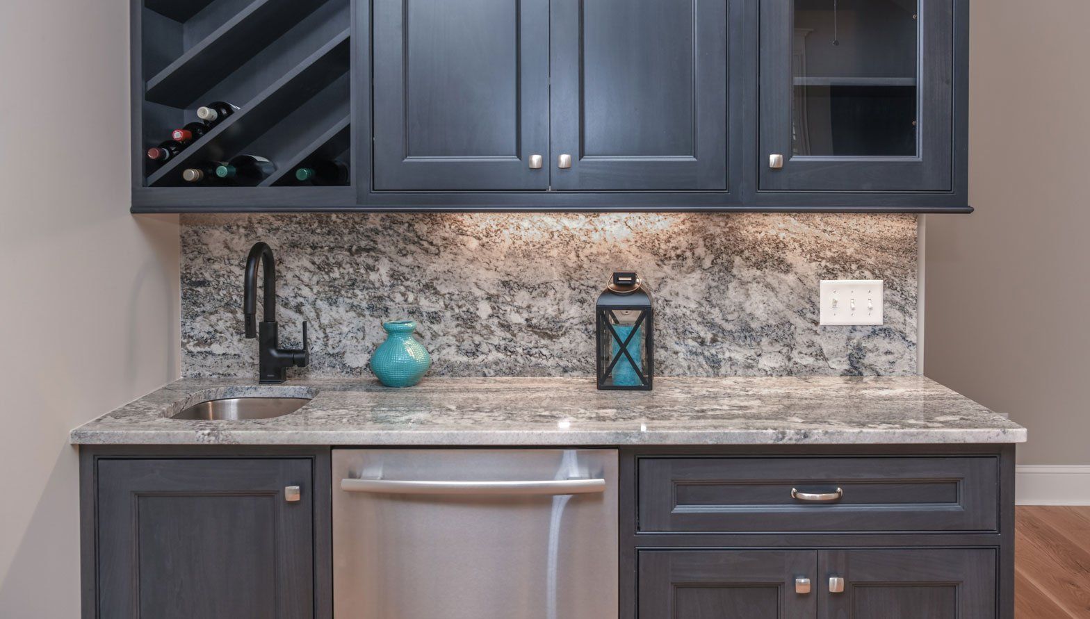 Elegant Marble Countertops — Dark Brown Cabinets on Marble Countertops in Savannah, GA