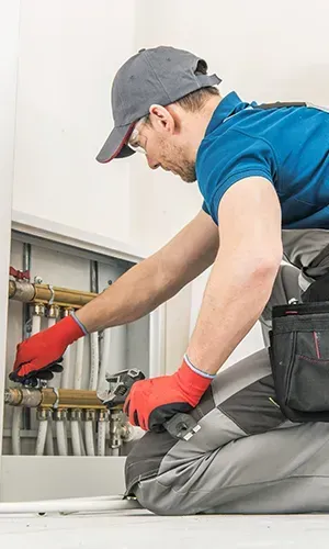 A robotic hand is pointing at a network of lines and dots.