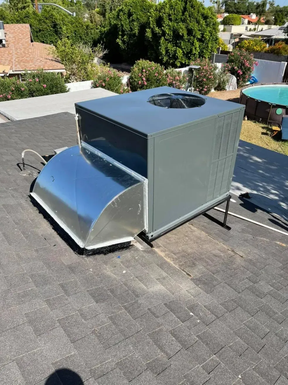 A centaur is standing on a rock holding a trident and shield.