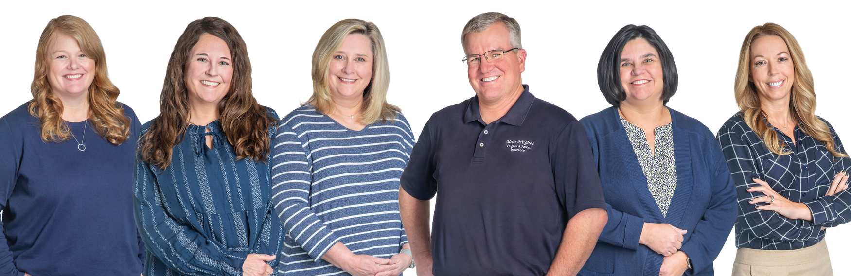 A man is sitting on a couch talking to two older people.