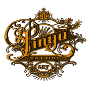 Sin Yu Tattoo Art logo with ornate gold and black filigree. Includes stylized text, brushes and laurel.