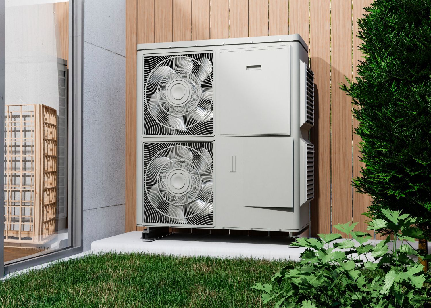 A large air conditioner is sitting on the side of a building in a backyard.