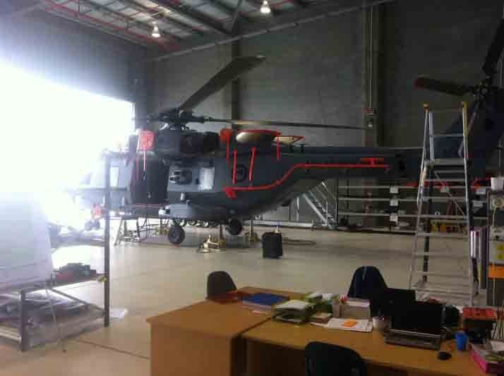 Helicopter being repaired