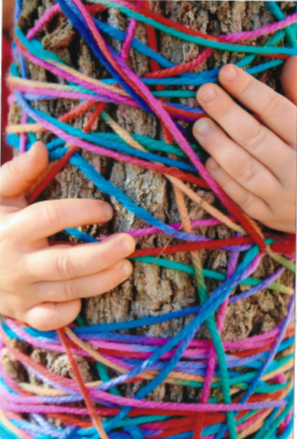 Hands and Colorful Yarn Tied on a Tree — Gap Community Early Learning Centre In Alice Springs, NT