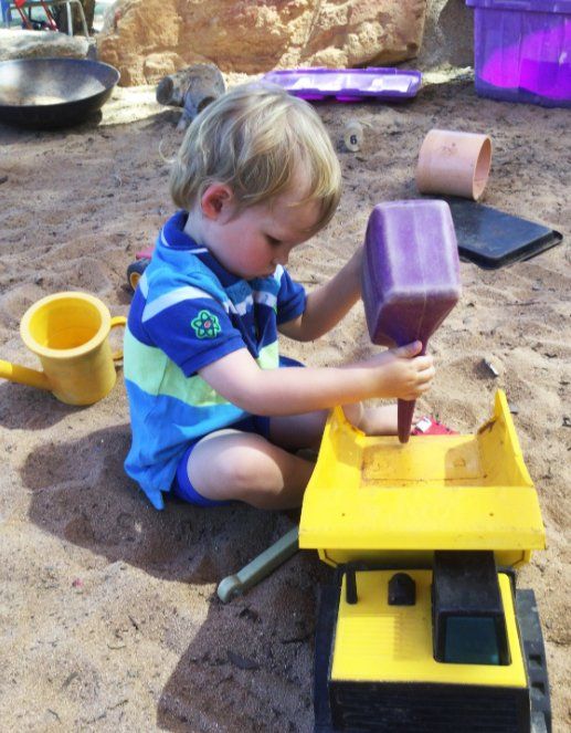 Boy playing with truck in the sandpit — Gap Community Early Learning Centre In Alice Springs, NT