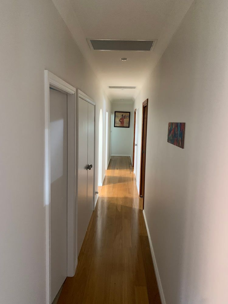 House Room Pathway with White Paint Wall — Painting in Forster