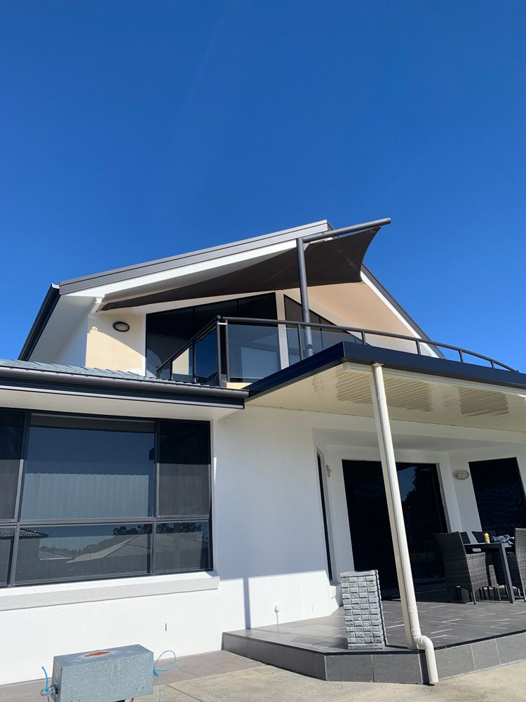 Home With Dark Coloured Accents — House Painting in Forster