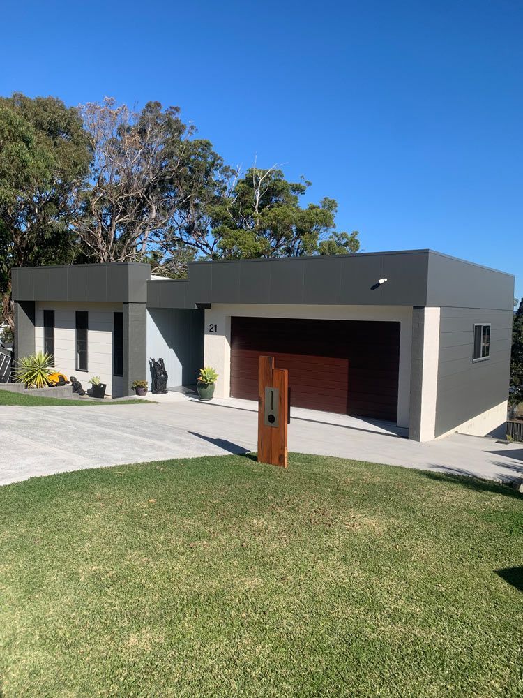 Home With Grey Facade — House Painting in Forster