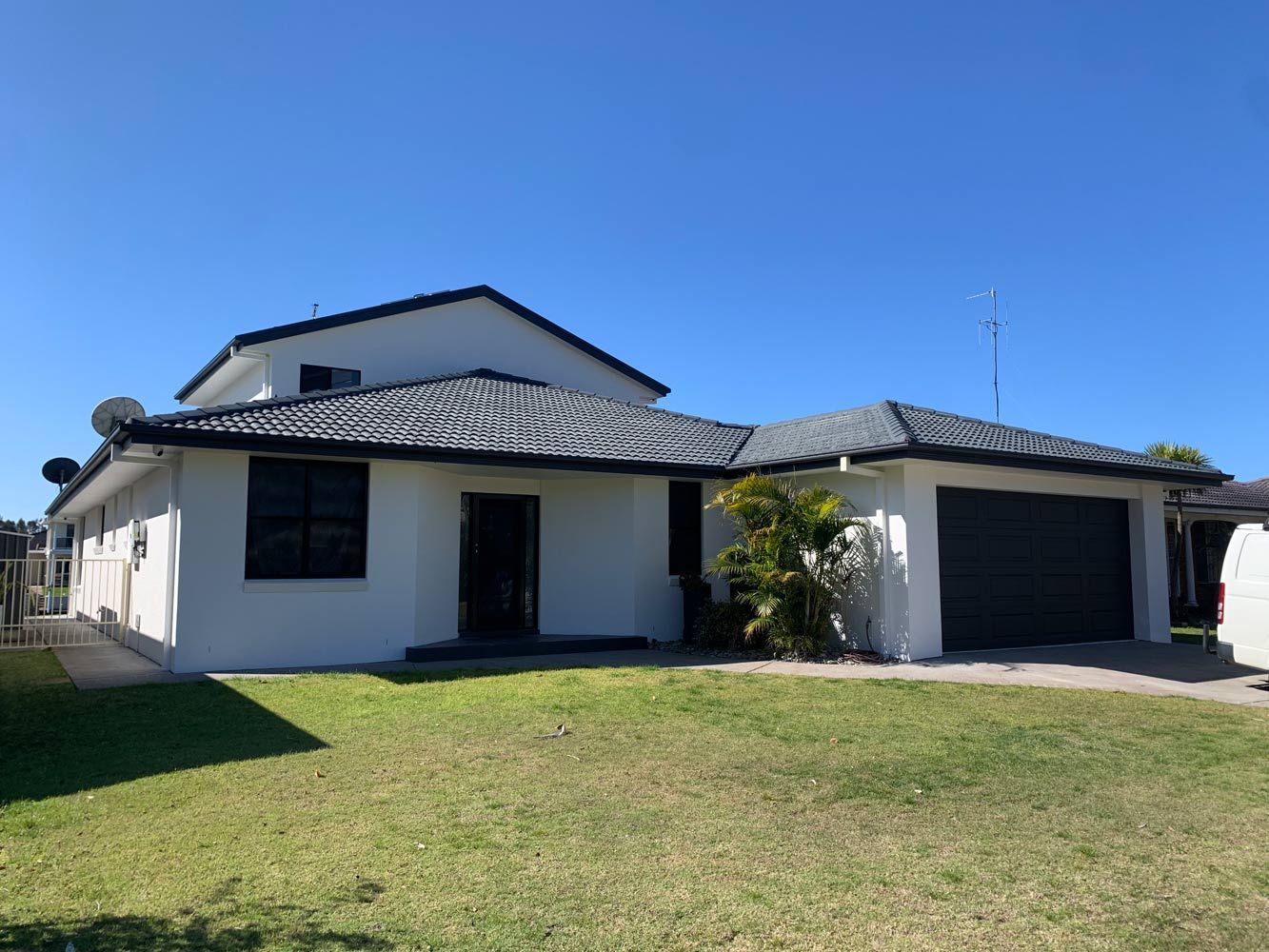Home With Dark Roof — House Painting in Forster