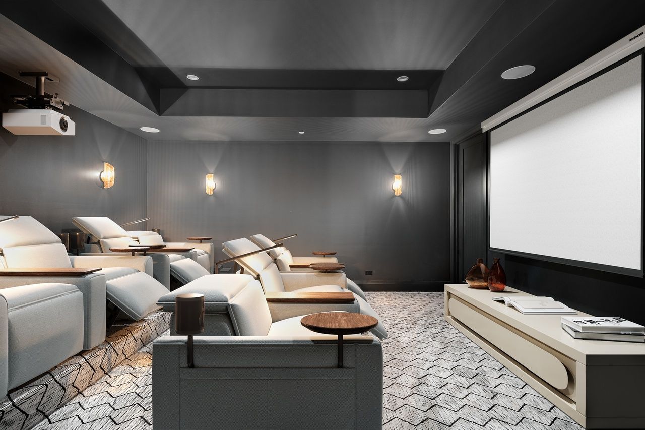 A home theater with a projector and a large screen.