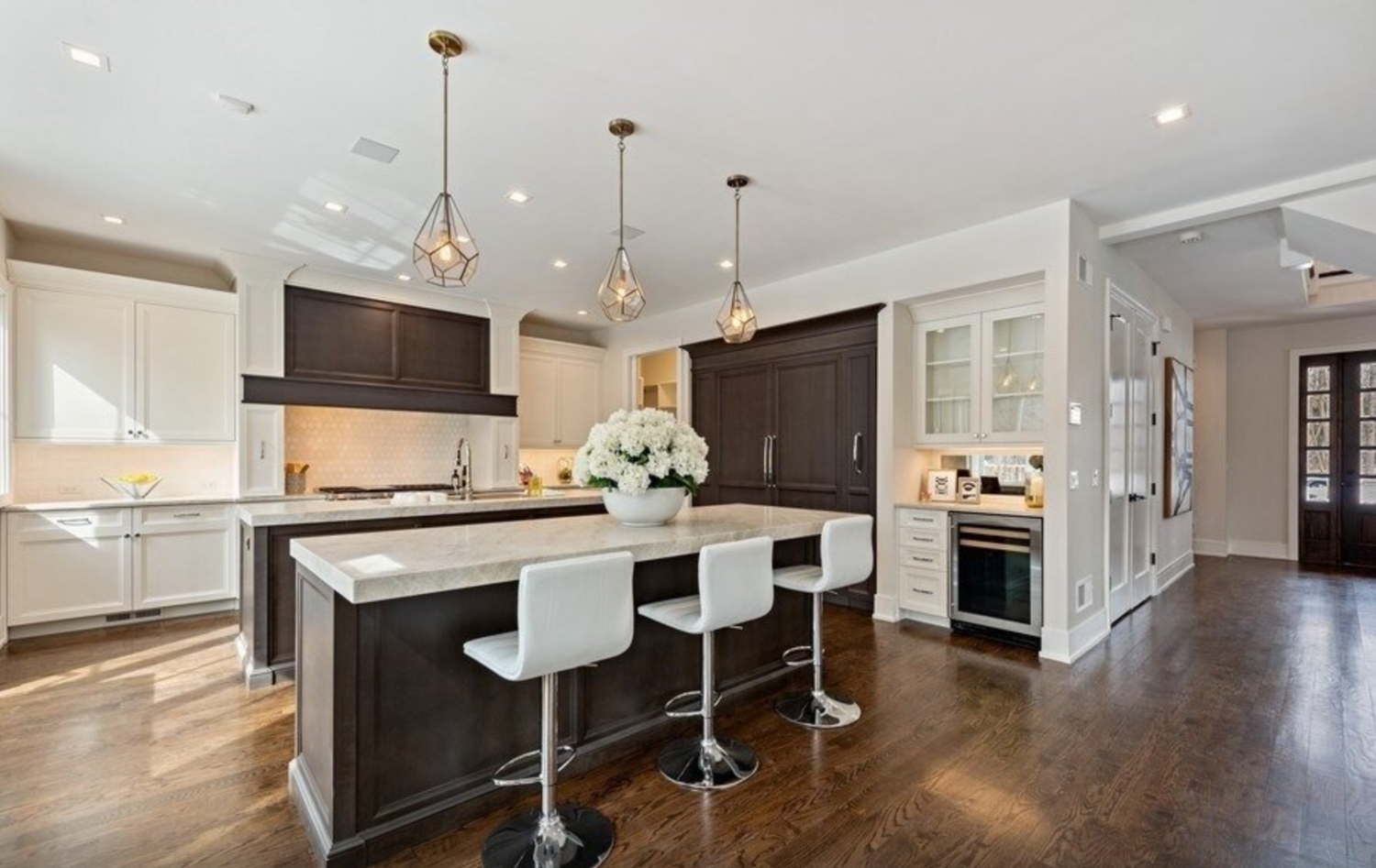 There is a large island in the middle of the kitchen.