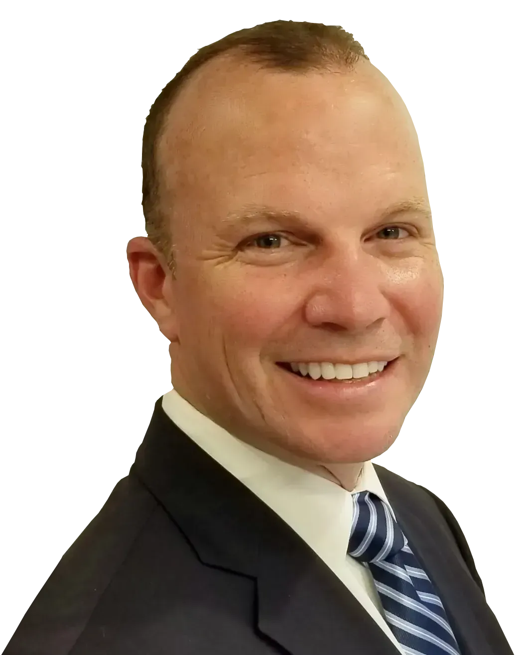 A person in a dark suit, white dress shirt, and blue striped tie smiling against a plain white background.