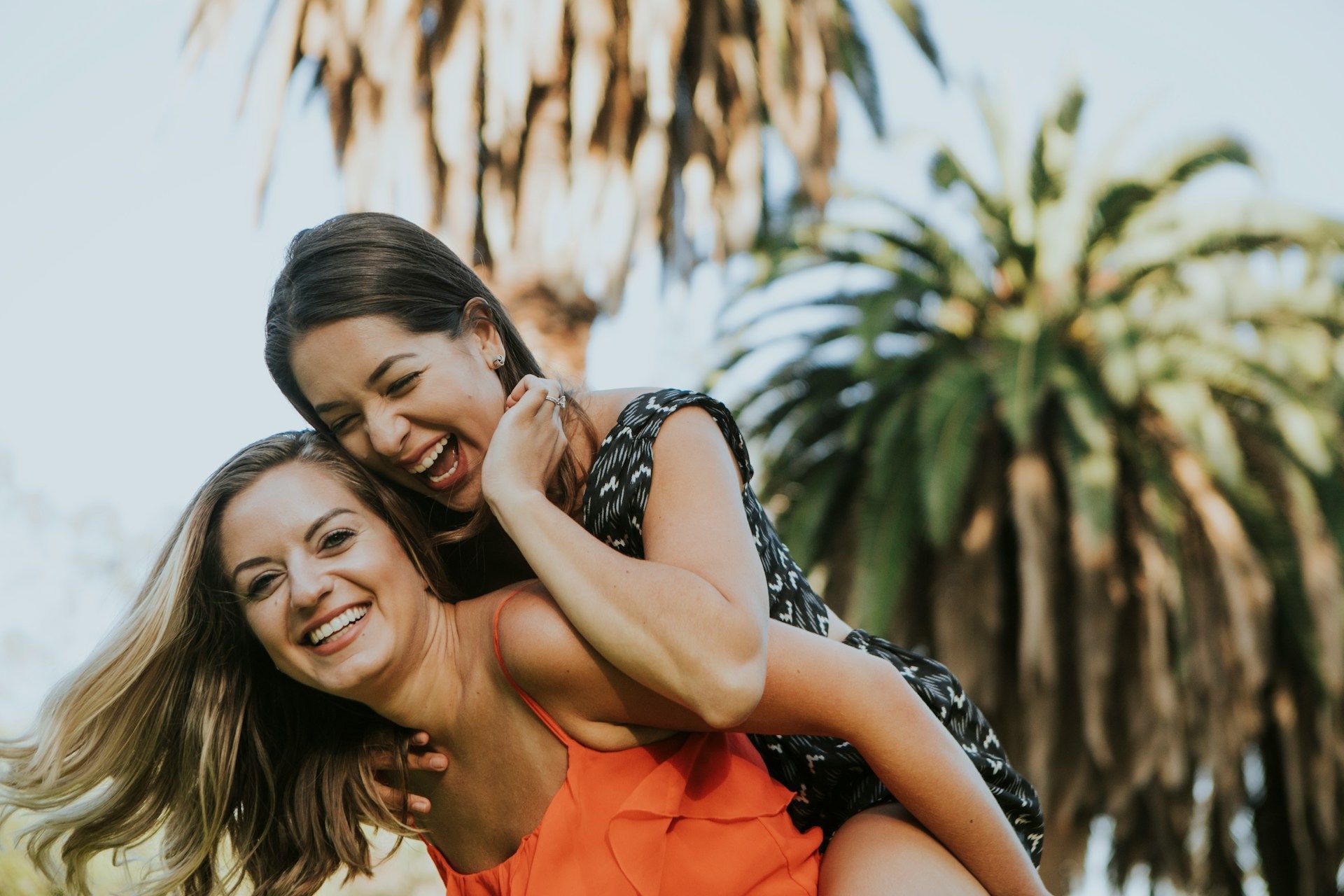 Skyscrapers and palm trees in Miami, Florida, on a sunny day.