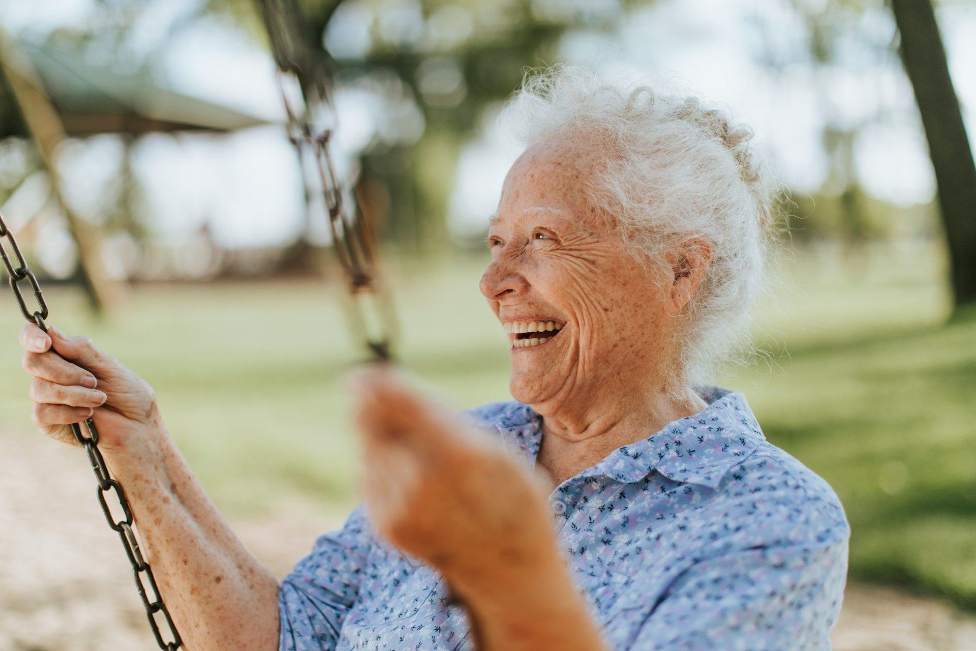 Skyscrapers and palm trees in Miami, Florida, on a sunny day.