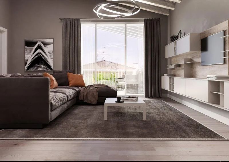 salotto moderno con ampia portafinestra