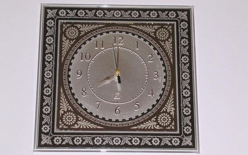 Orologio in specchio decorato