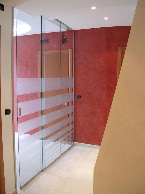 porta scorrevole con vetro