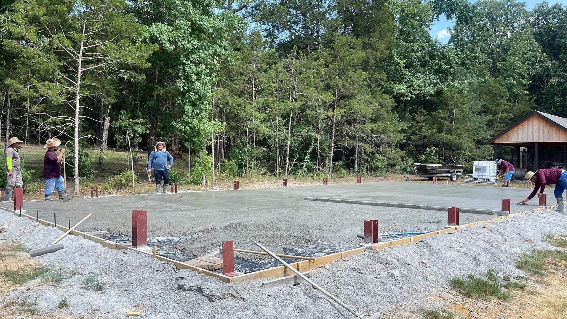 A group of people are working on a construction site.