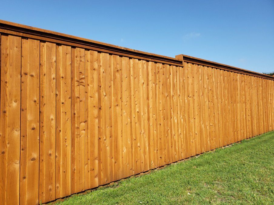 Wooden Fence Stained a Golden Brown — Capital Fencing in Queanbeyan, NSW