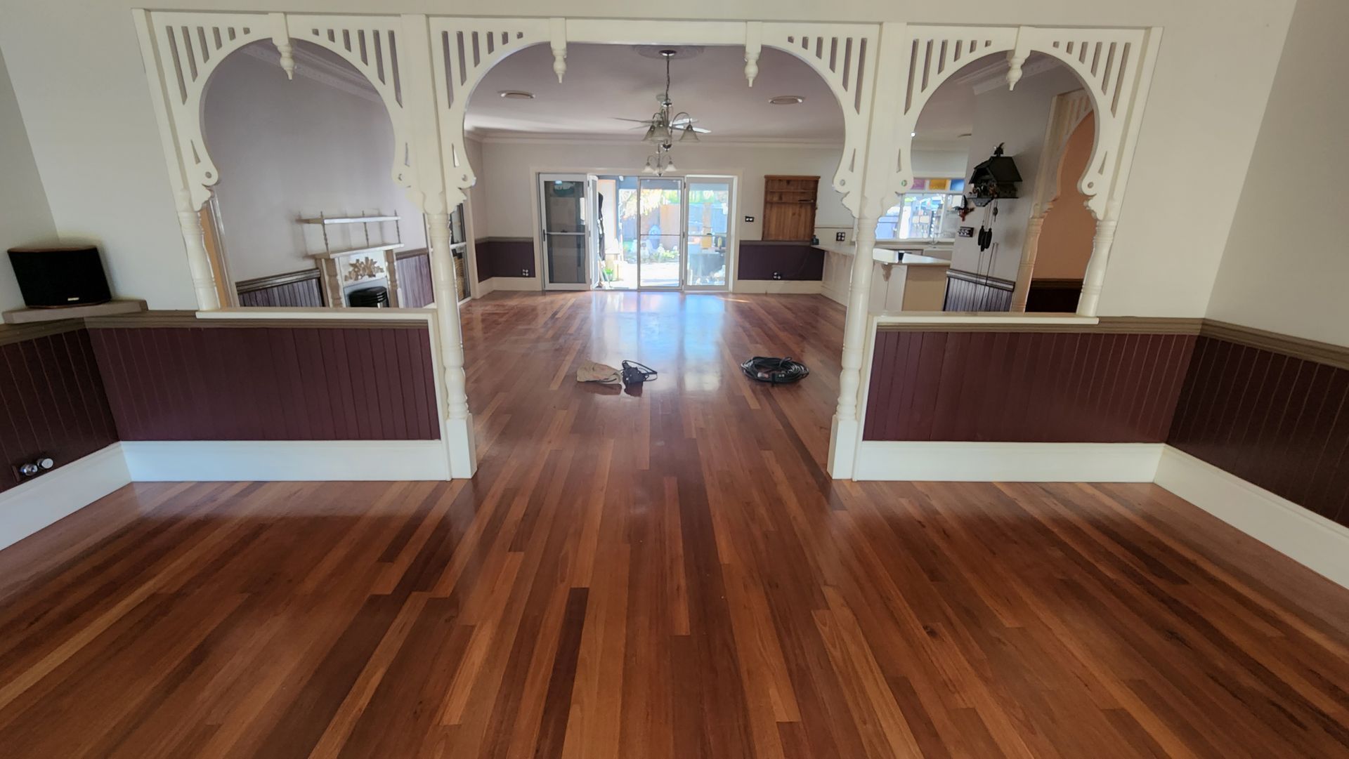 A Brush is Sitting on Top of a Wooden Table — Shane Callinan Floor Sanding In Port Macquarie, NSW