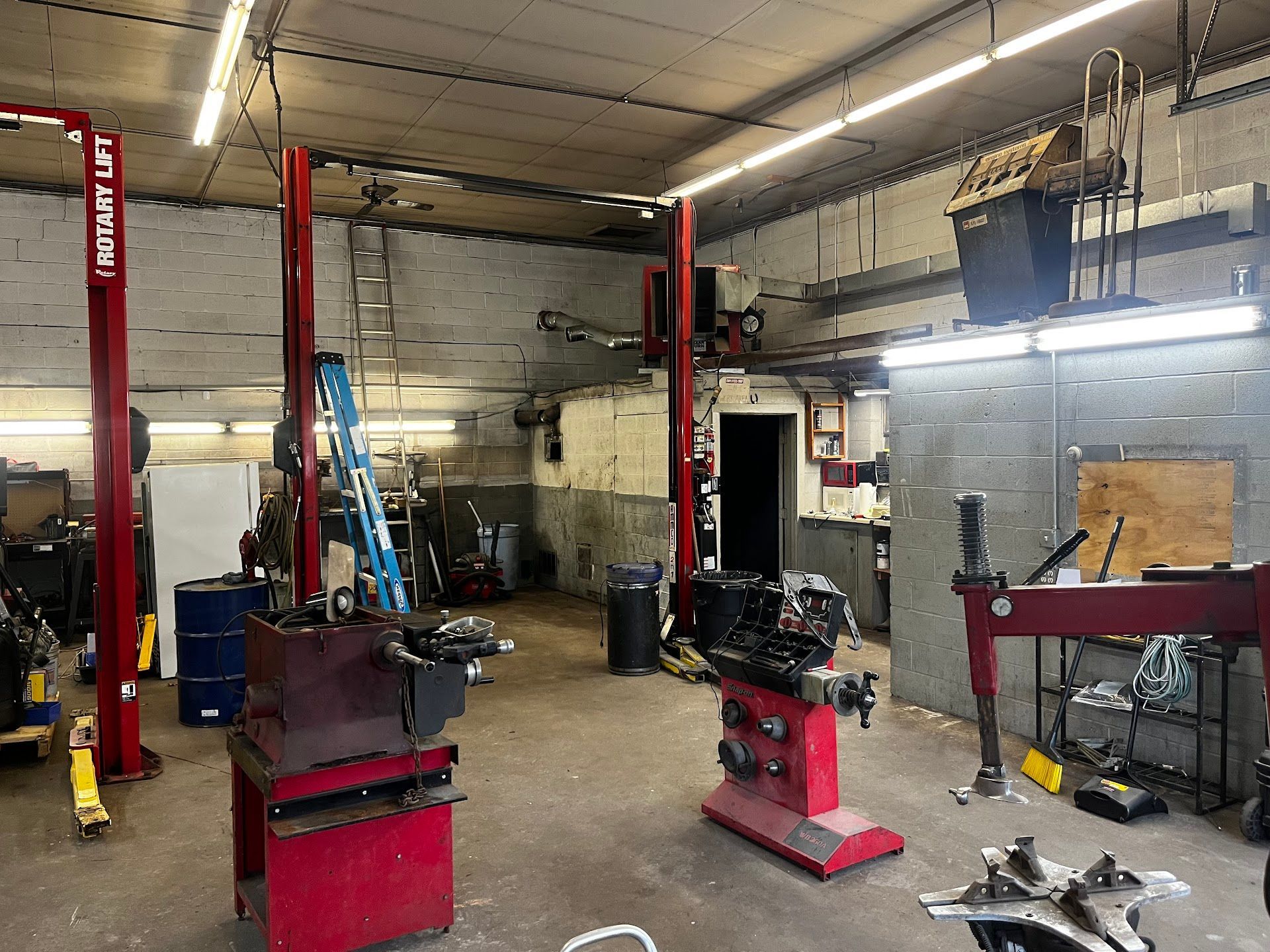 Interior Of Workshop With Vehicle Lifts | Absolute Auto Repairs & Sales