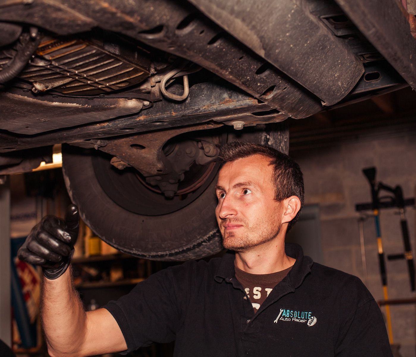 Mechanic Performing Undercar Inspection | Absolute Auto Repairs & Sales