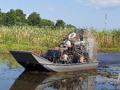 Boat on Marsh - Baton Rouge, LA - Coastal Environments, Inc.