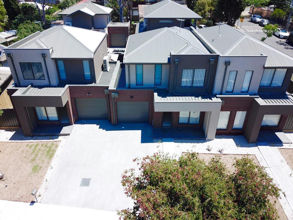 An Aerial View of A Row of Houses in A Residential Area — Iconic Construction Industries in Garbutt, QLD