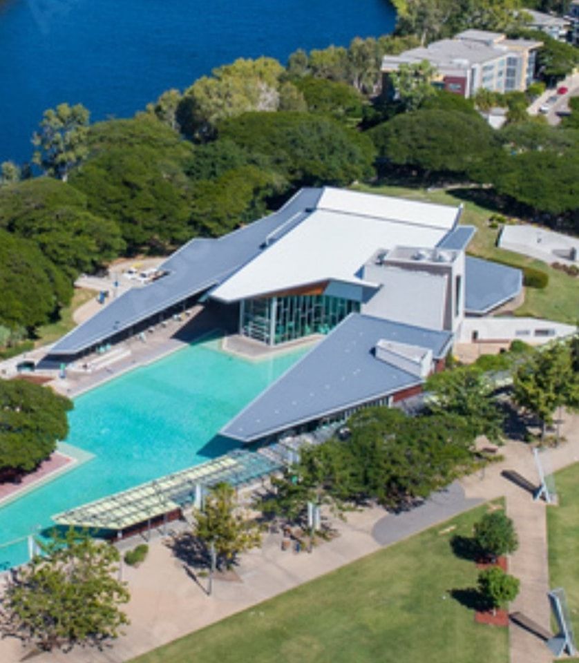A Large Empty Office with White Ceiling — Iconic Construction Industries in Garbutt, QLD