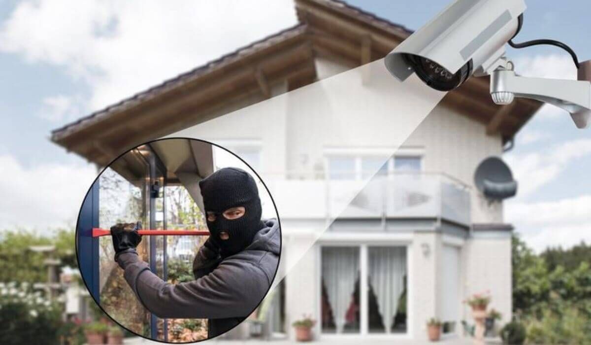 Sydney homeowner installing a security camera