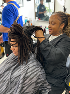Man getting dreadlocks