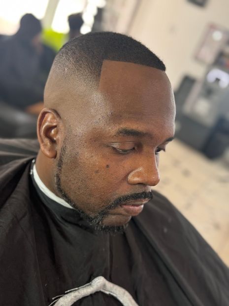 Boy with razor styled haircut