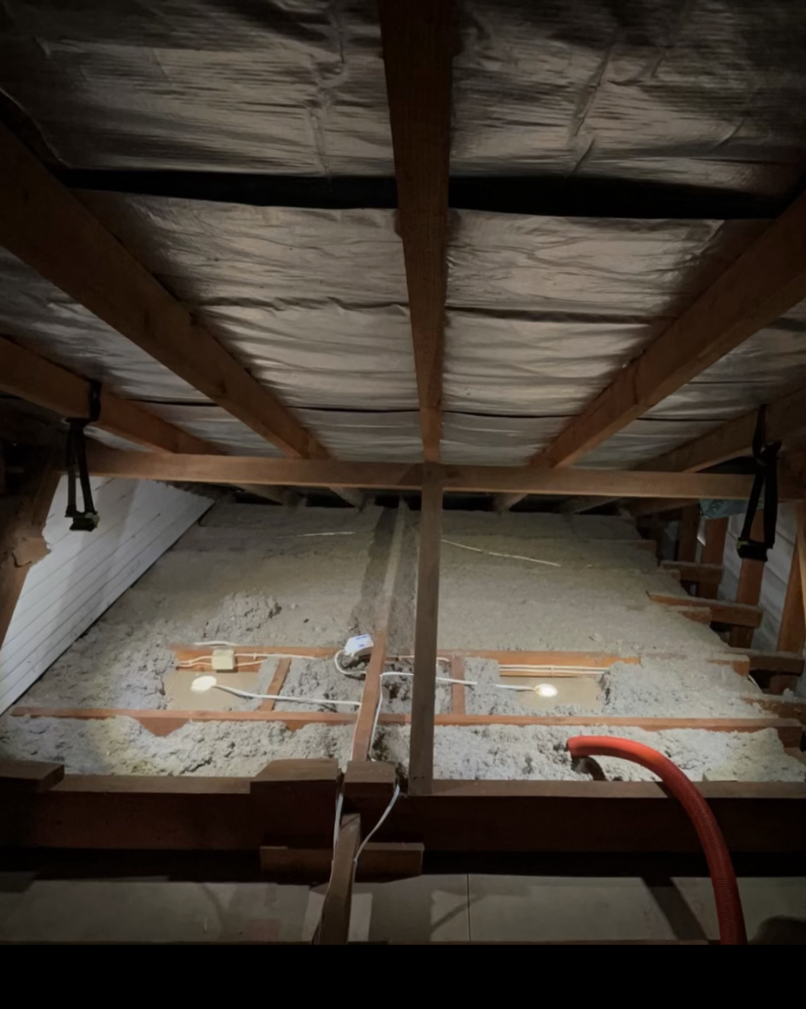 Photo of roof cavity prior to it being vacuumed.