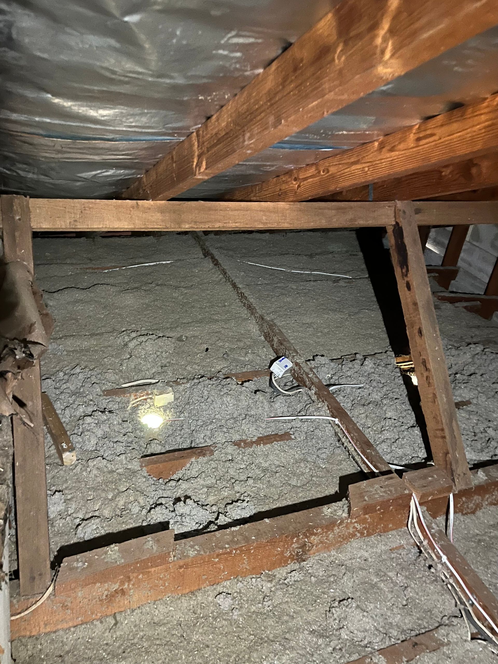 Photo of roof cavity prior to it being vacuumed.