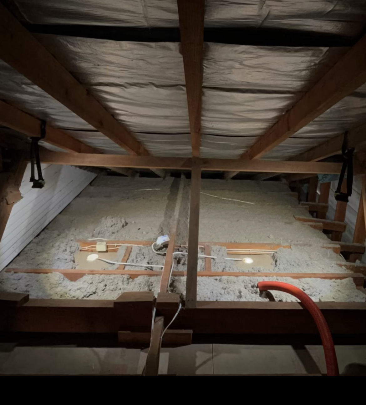 Photo of roof cavity prior to it being vacuumed.