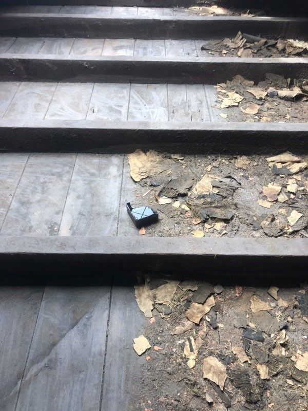 Close up of an area within the roof that has been vacuumed compared to an area that has not.